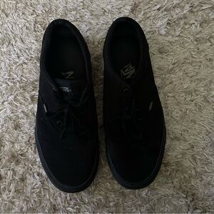 Women’s all black Vans